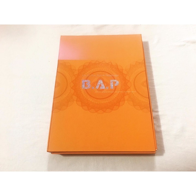B.A.P 1st repackage Album đã khui seal, gồm cd và photobook rời như hình.
