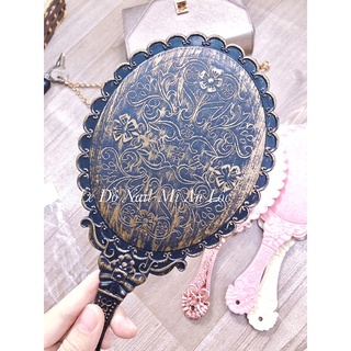 Gương soi cầm tay