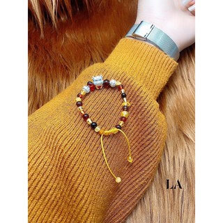 Lắc tay hổ phách mix charm bạc ( giáp trâu)