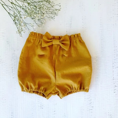 Quần Đùi Short Cho Bé Gái Có Nơ Siêu Dễ Thương Chất Đũi Xước Mát Nhẹ Size 10-21kg