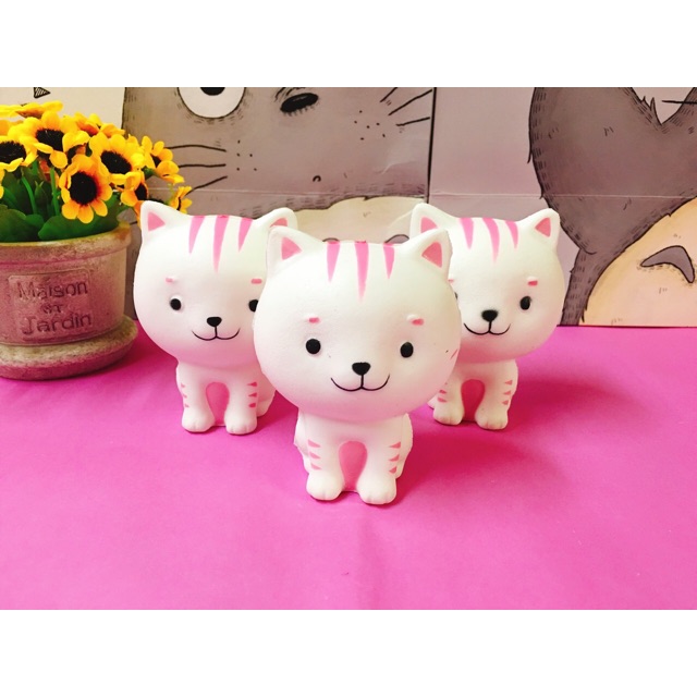 Squishy mèo ngồi chậm tăng