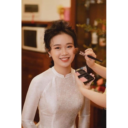 Áo dài gấm trơn đính ngọc