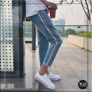 (quần jean baggy nam nữ)quần bò baggy unisex line trắng vàng gấu tua SB23