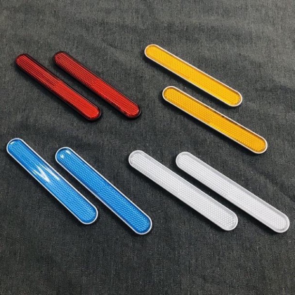 Mắt mèo dán phuộc phản quang ( giá 1 đôi ) (loại dài)