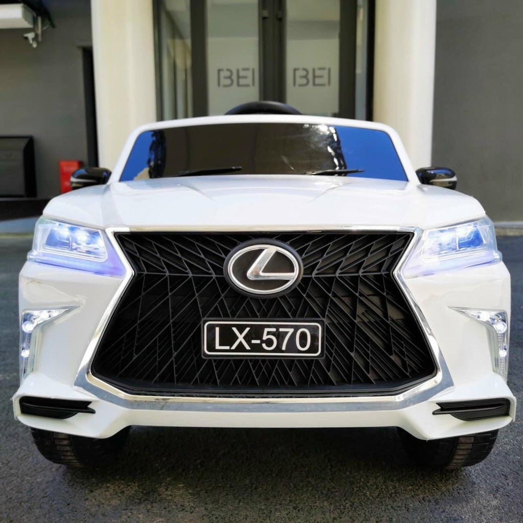 Ô tô điện trẻ em BABY-KID LEXUS 570 2 chế độ tự lái và remote, 2 chỗ ghế đôi, 4 động cơ lớn, ắc qui 12v