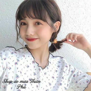Cột tóc hoa cúc xinh xắn