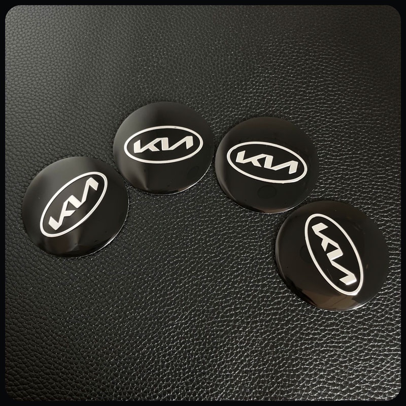 Bộ 4 Miếng Dán Trang Trí Trục Bánh Xe Hơi 56mm In Logo Kia KN K5 K3 KX1 Sorento Sportage Rio Soul