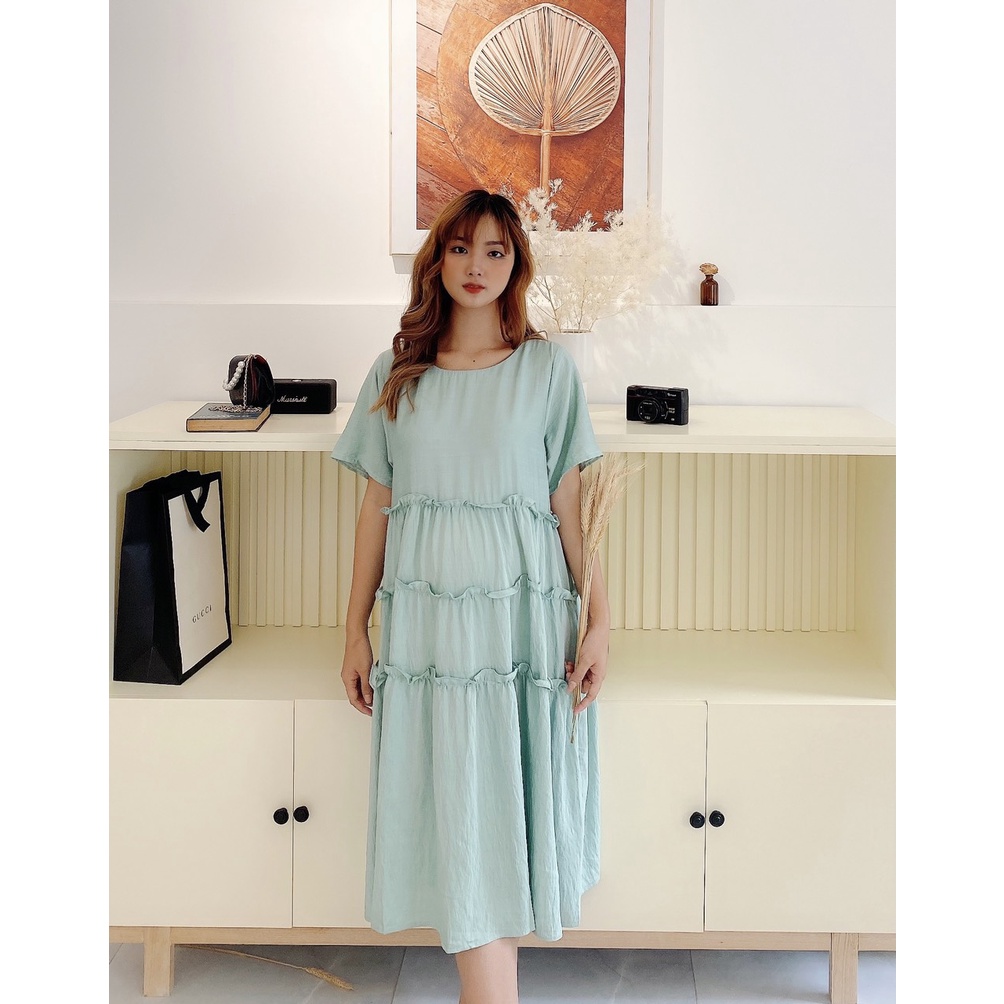 Đầm bầu nhún tầng xinh xăn