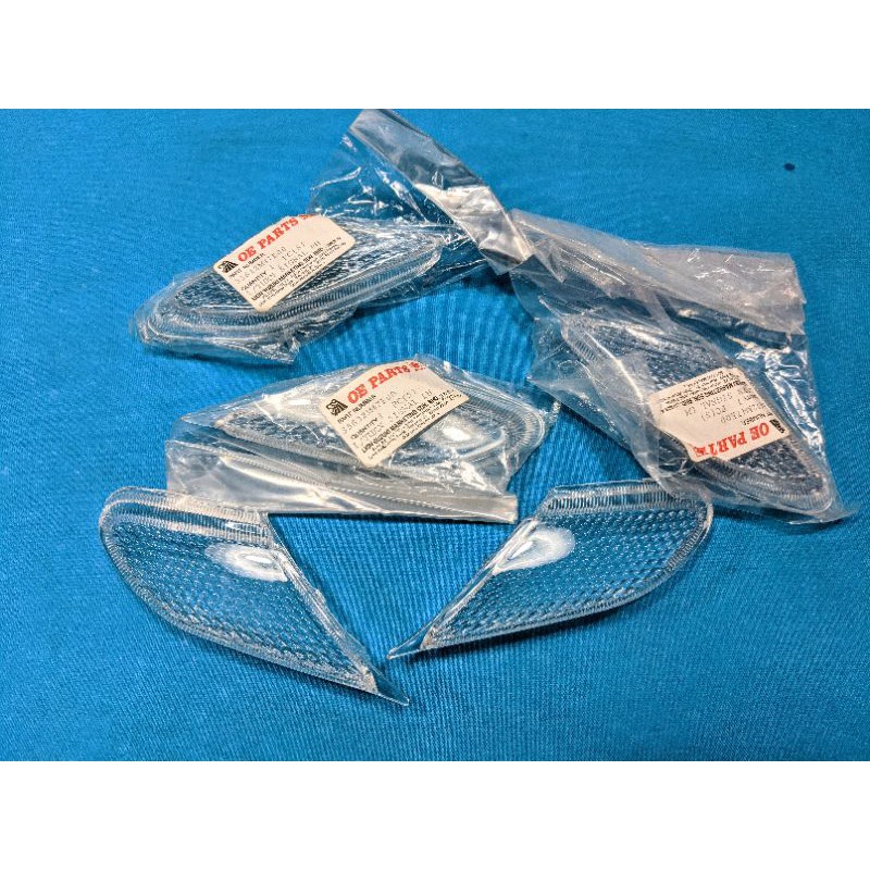 Chụp đèn xinhan trước Suzuki FX 125 chính hãng