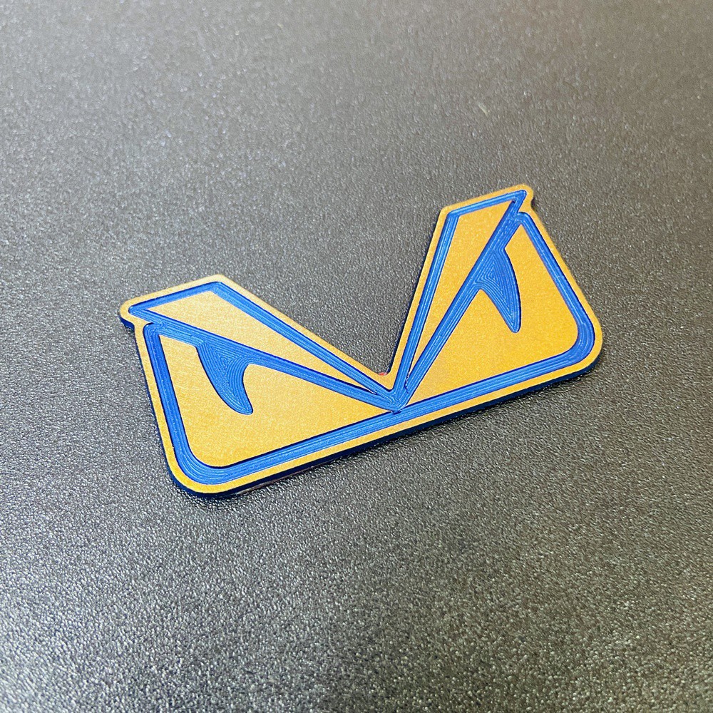 TEM trang trí xe máy HOẠT HÌNH MẮT CÚ chất liệu TITANNIUM