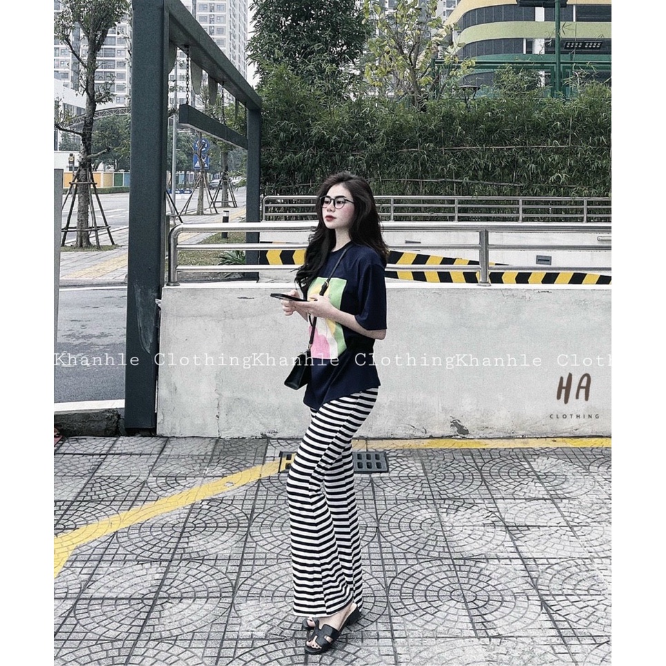 set bộ áo thun form rộng cô gái tóc vàng quần loe dài sọc k