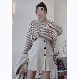Chân váy 3 cúc đen dọc