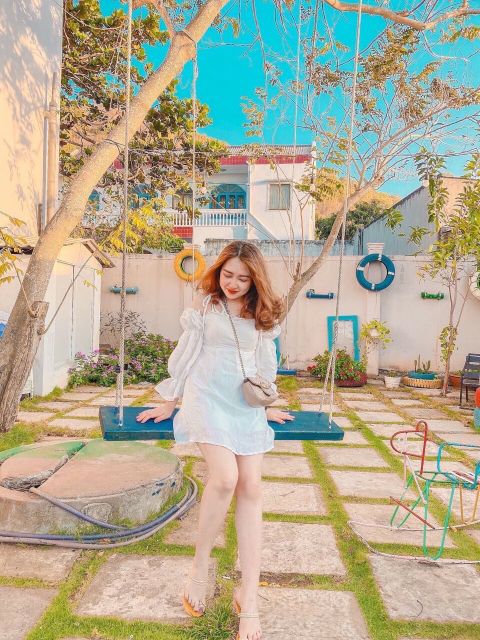 Đầm kiểu rớt vai trắng tinh khôi