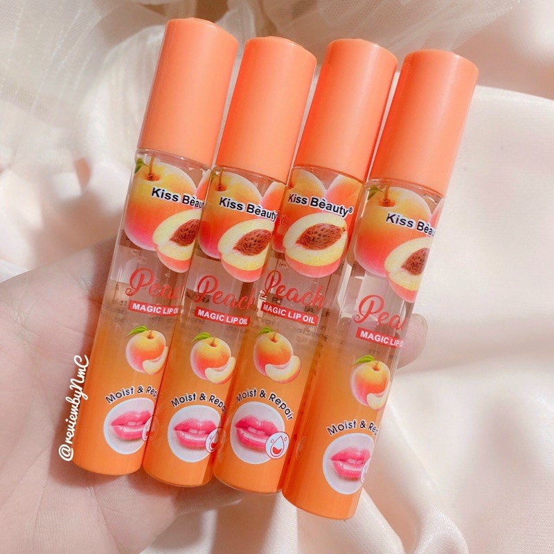 Son Bóng Dưỡng Môi Peach Magic Lip Trong Suốt ,Không Thấm Nước. Giúp Môi Căng Mọng, Mịn Màng.Dòng Son Dưỡng Ẩm.