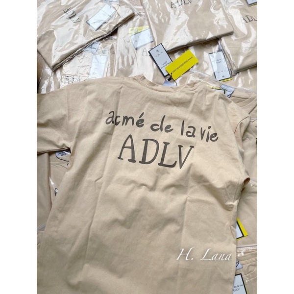 ÁO PHÔNG MÀU BE CHỮ ADLV | BigBuy360 - bigbuy360.vn