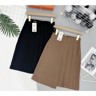 Chân váy xếp ly cúc