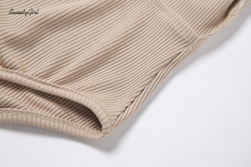 Áo liền quần hở lưng cổ tròn tay dài màu trơn thời trang nữ tính