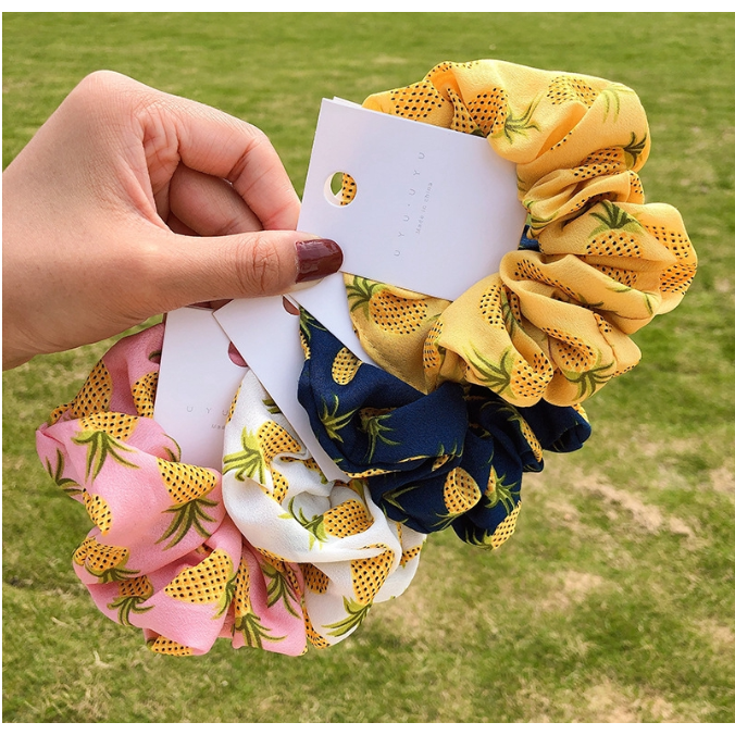 Thun cột tóc hình trái dừa phong cách thời trang dễ thương cho phái nữ