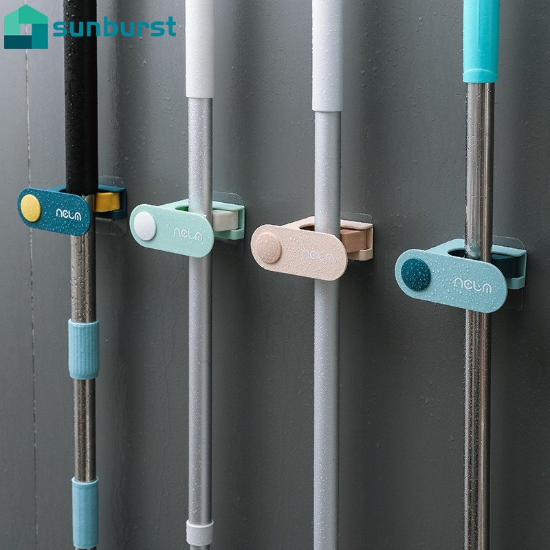 Giá đỡ cây lau nhà gắn tường tự dính thiết kế tiện dụng