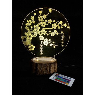 Đèn led cây Mai đế gỗ vỏ tròn.