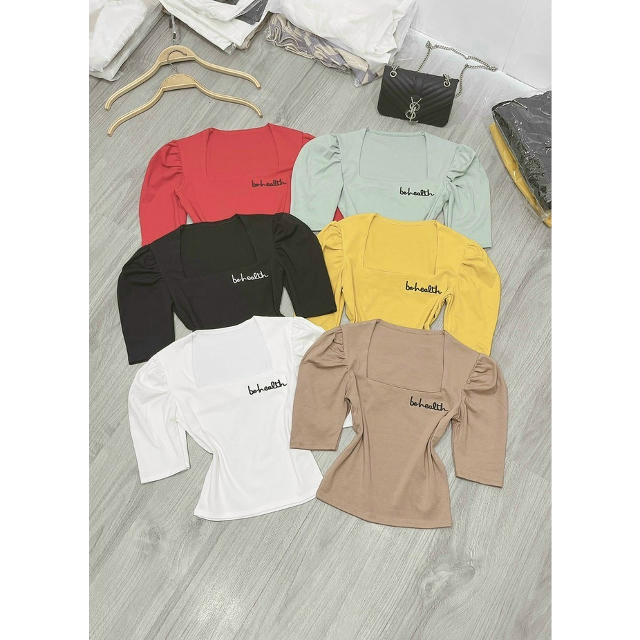 Áo thun croptop cổ thuyền in chữ nhỏ tay lỡ