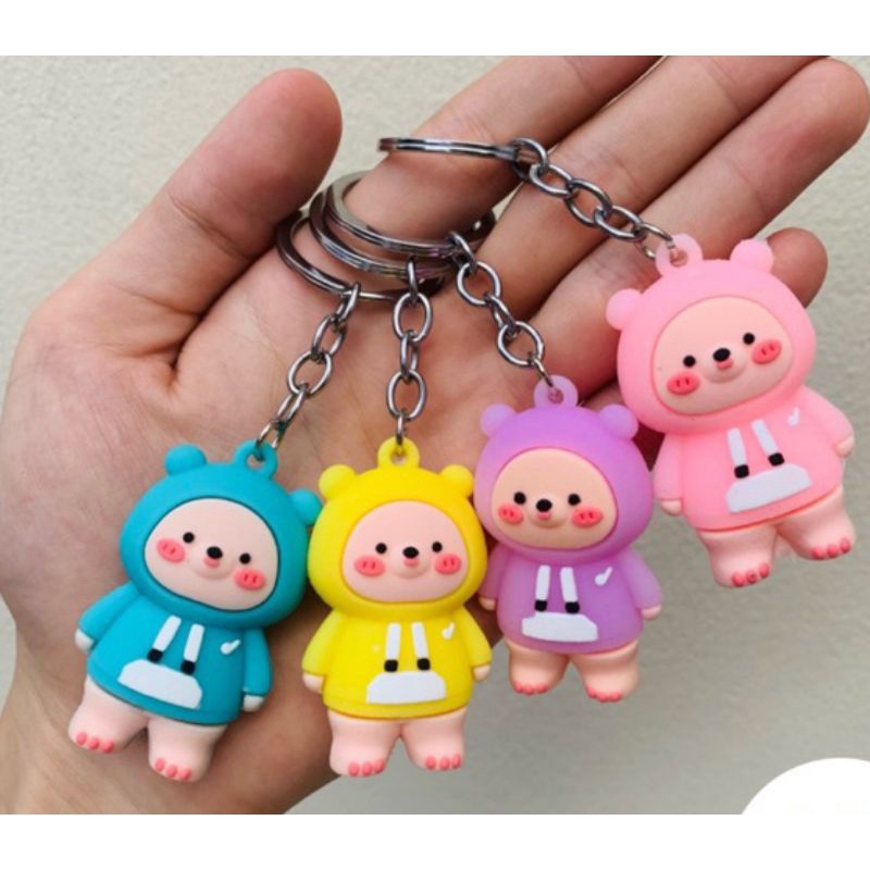 Móc khóa gấu mặc áo má hồng