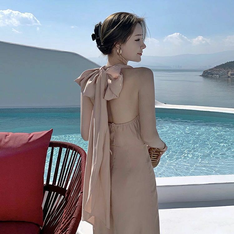 Bộ Áo Liền Quần Hai Dây Lưng Cao Ống Rộng Thắt Nơ Thời Trang Đi Biển
