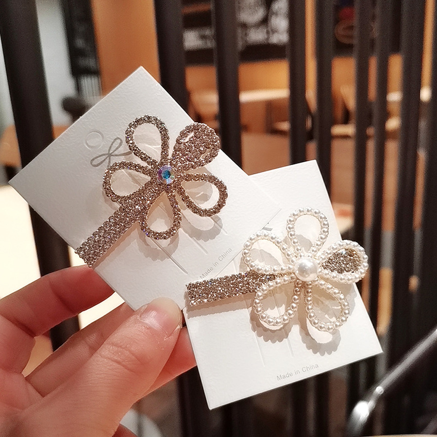 Kẹp tóc đính ngọc trai nhân tạo hình bông hoa xinh xắn cho nữ