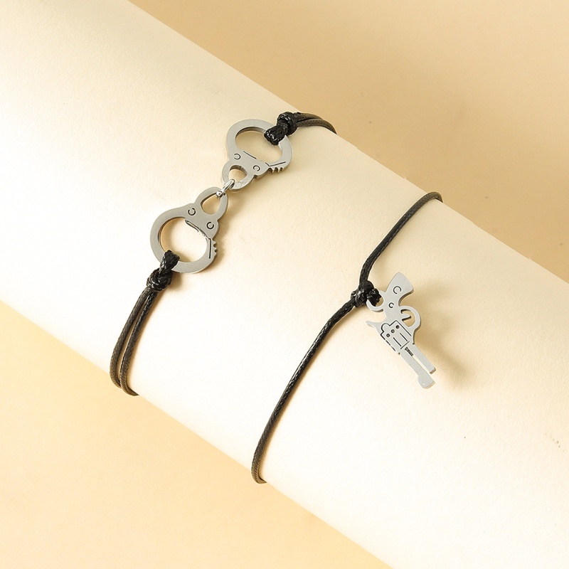 Vòng Cổ Choker Bằng Thép Không Gỉ Hình Còng Tay Và Súng Lục Độc Đáo