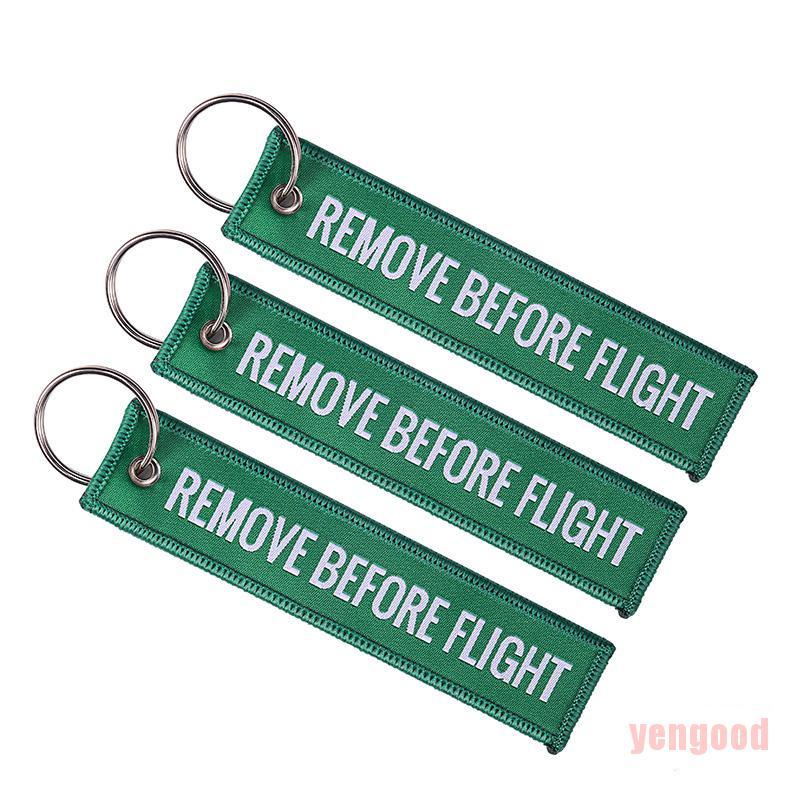 Móc khóa thêu chữ REMOVE BEFORE FLIGHT nhiều màu tùy chọn