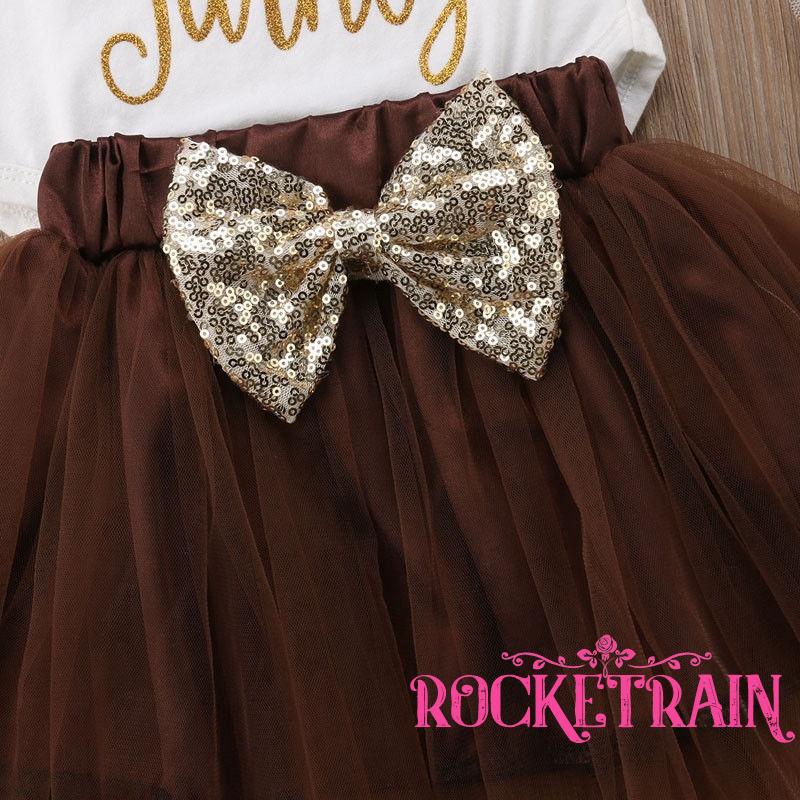 Chân váy xòe họa tiết hình học cho bé