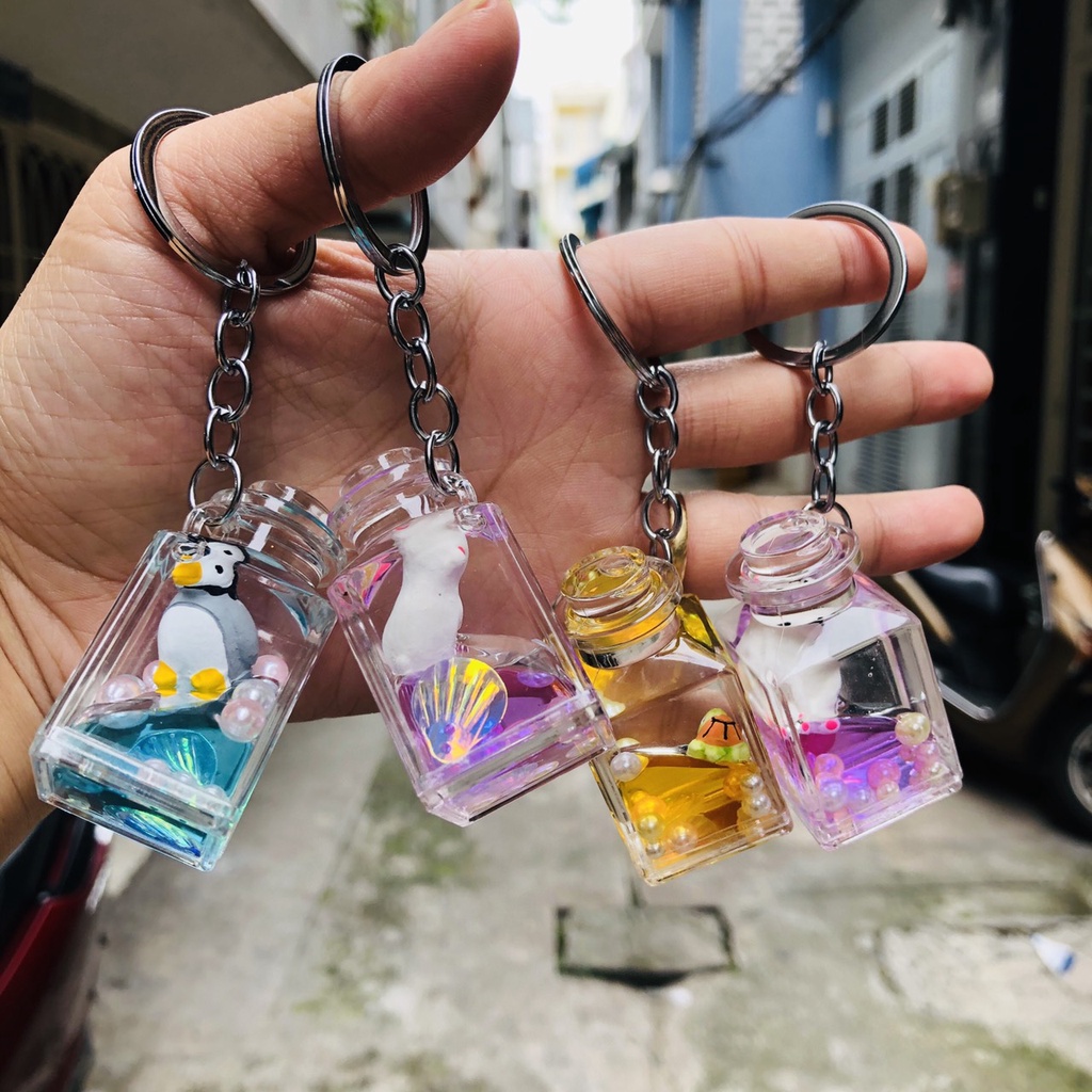 Móc khóa nước kim tuyến dễ thương DTOnline (ngẫu nhiên)