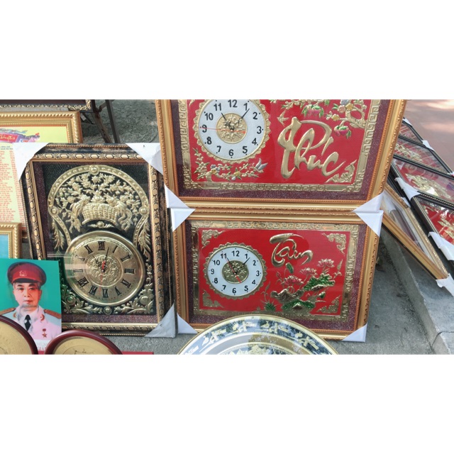 Tranh đồng hồ bằng đồng