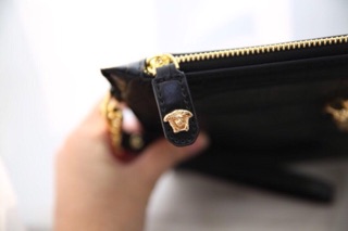 Clutch cầm tay da rắn