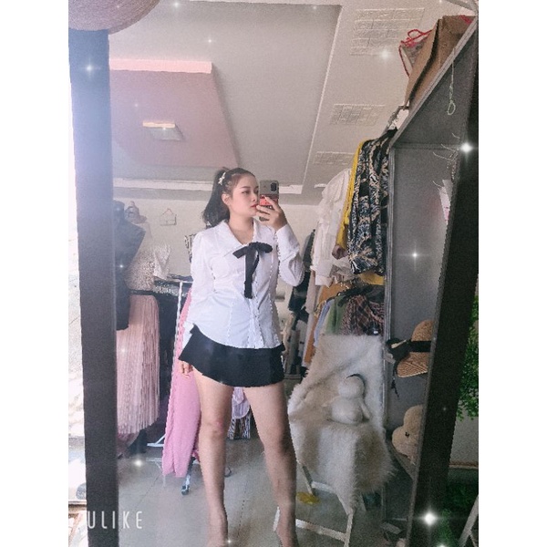 Áo sơ mi trắng có nơ