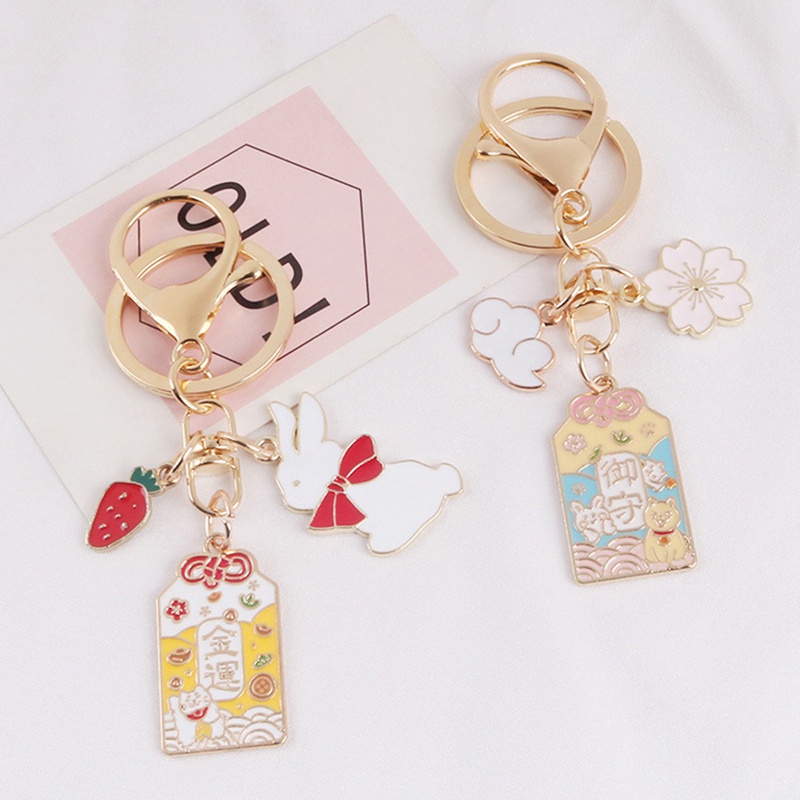 Móc khóa hình hoa anh đào cầu may mắn phong cách thời trang Nhật Bản