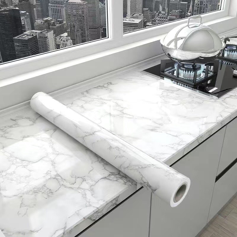 Giấy dán bếp chống dầu mỡ, decal dán tường bếp giả vân đá, miếng dán tủ lạnh, bàn học cách nhiệt Kim Huệ