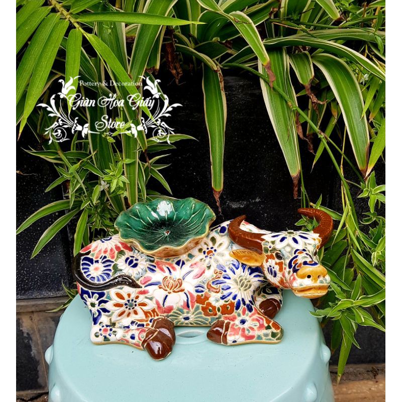 Trâu gốm bách hoa