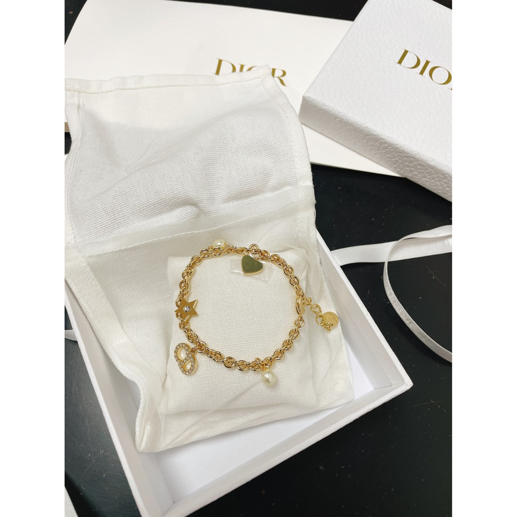 Vòng tay  phối hạt ngọc trai và ngôi sao phong cách retro sang trọng