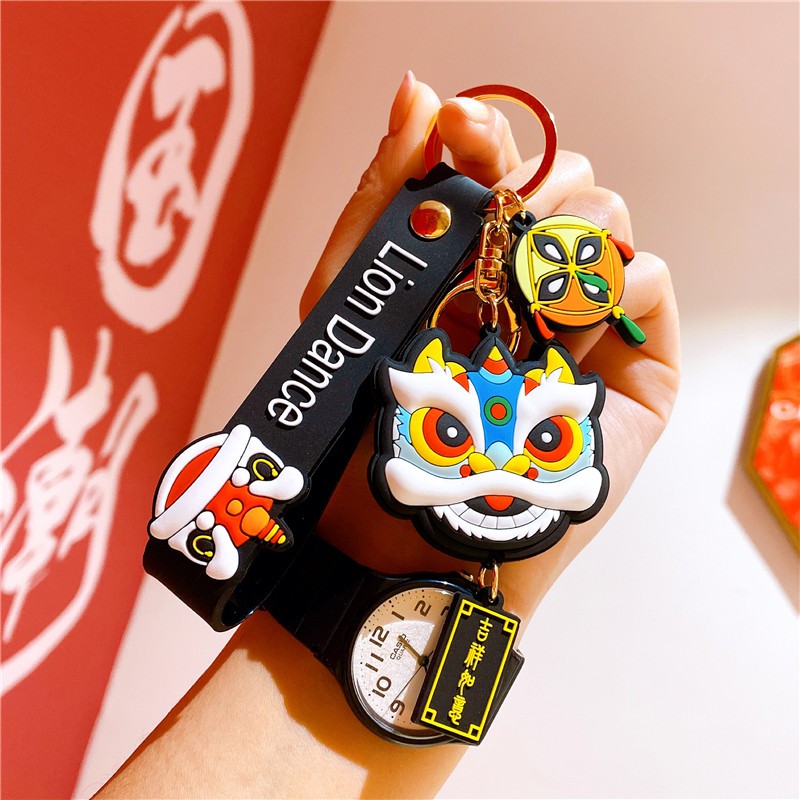 Móc khóa nhựa dẻo hình đầu Lân cá tính