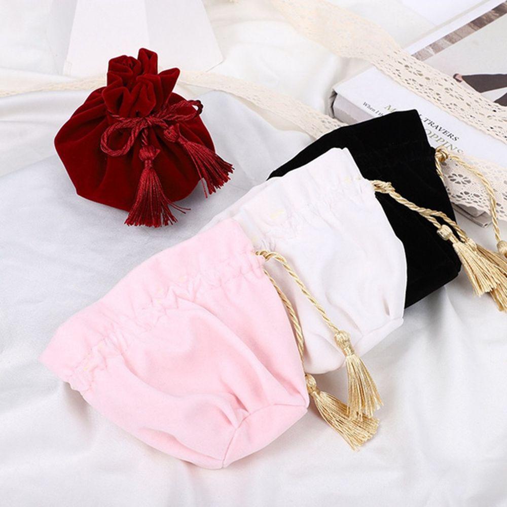 Túi Đựng Trang Sức Đế Tròn Phối Tua Rua Phong Cách Retro
