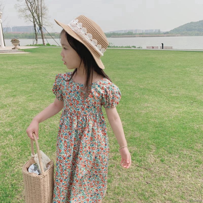Đầm Bé Gái Hở Lưng Tay Ngắn In Hoa Dễ Thương