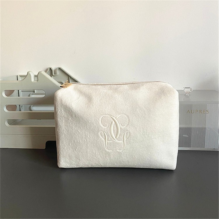 ✵✽Túi mỹ phẩm Guerlain màu trắng lông mịn cầm tay thời trang đơn giản dung tích lớn đựng ly hợp kết cấu hoàn thiện