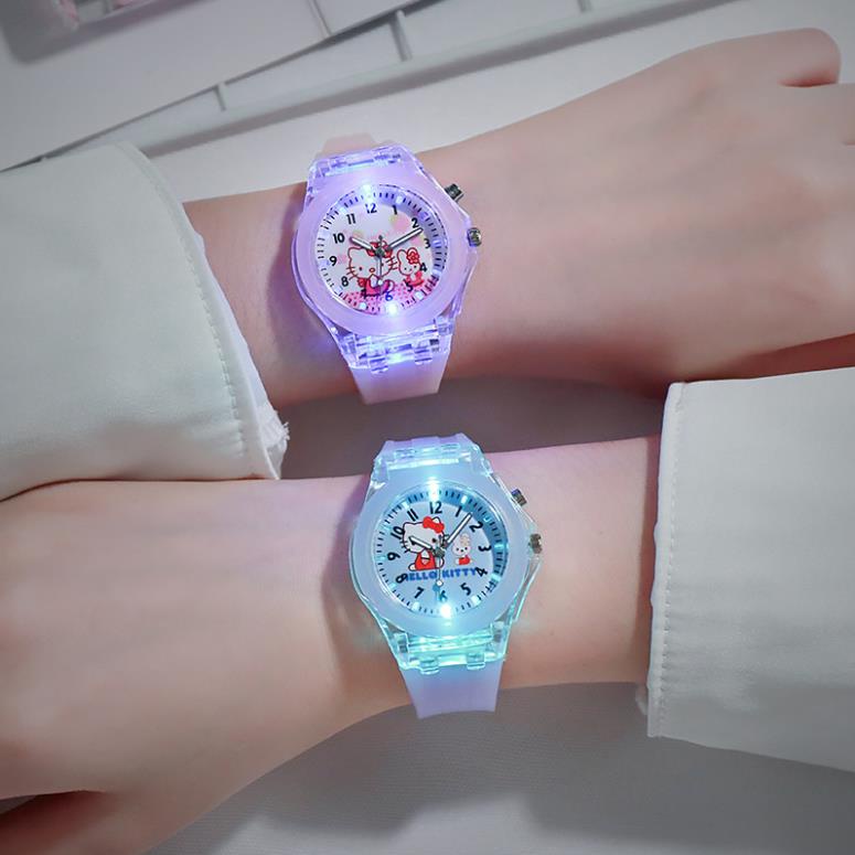 Đồng hồ đeo tay dây đeo silicon hình Hello Kitty màu dạ quang xinh xắn dành cho bé gái