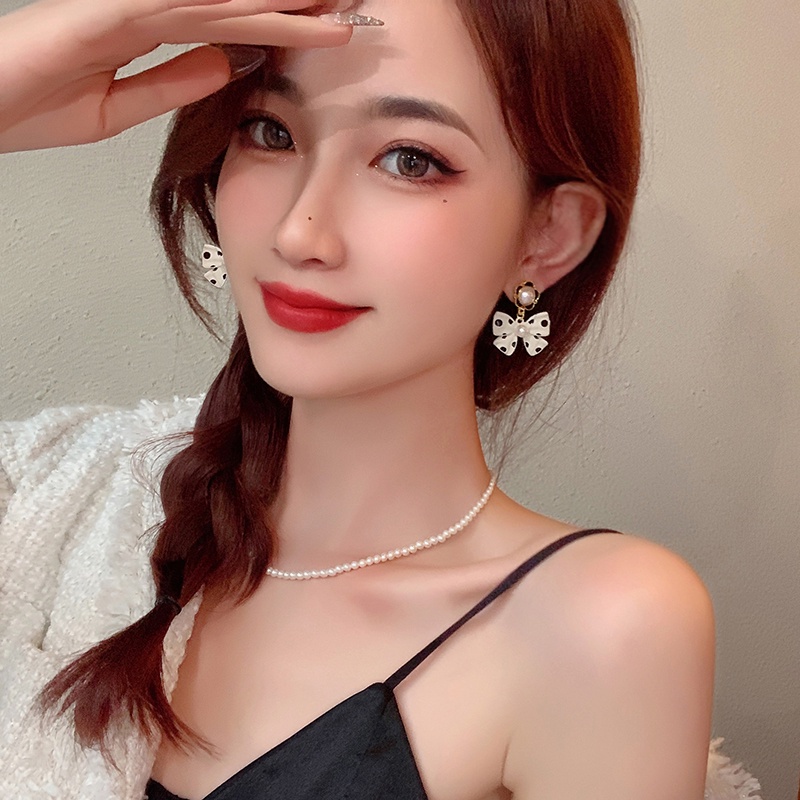 Bông Tai Hình Nơ Chấm Bi Đen Đính Ngọc Trai Phong Cách Hàn Quốc Thời Trang Cho Nữ