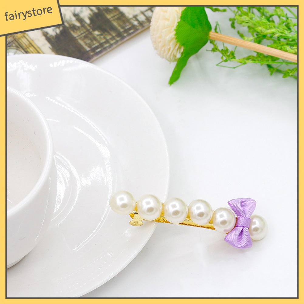 Kẹp tóc hình nơ đính ngọc trai thời trang