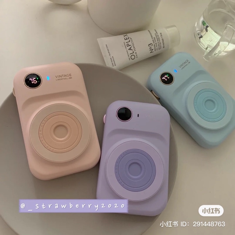 Sạc pin dự phòng không dây có hai dây cắm màu pastel