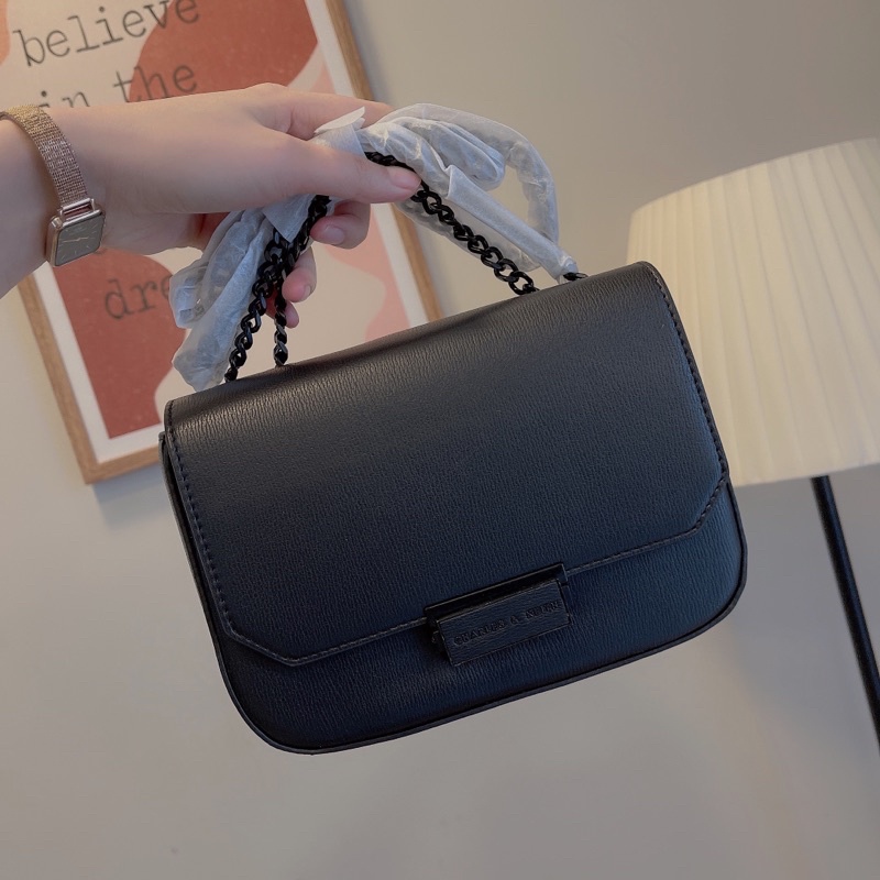 Túi nắp bấm full tag đen