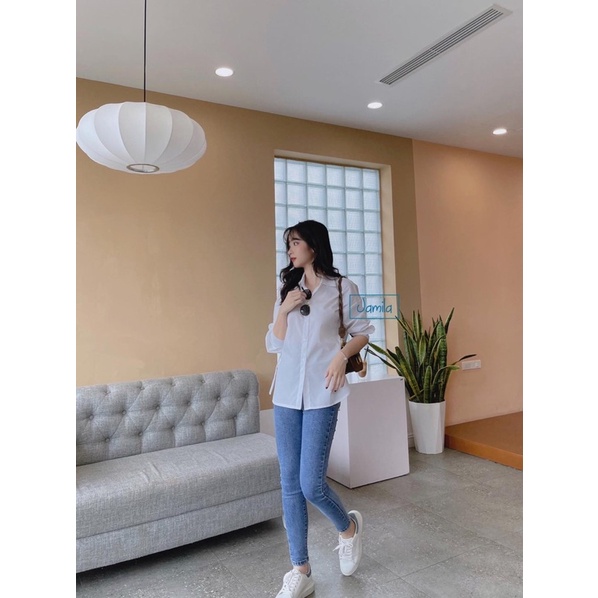 Áo sơ mi trắng xẻ tà
