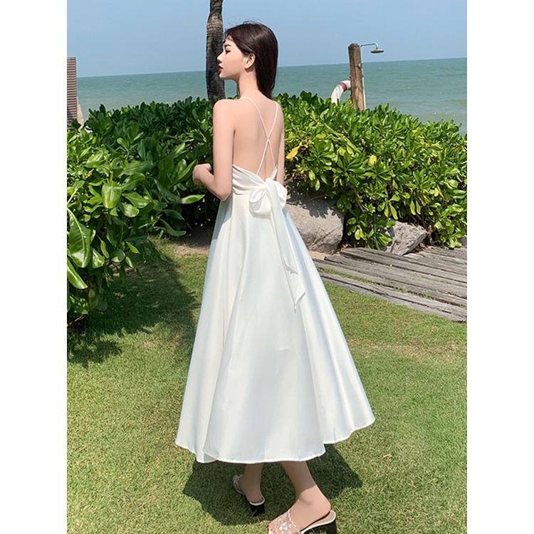 Đầm Maxi Màu Trắng Thiết Kế Nơ Lưng Chất Lụa Chéo May 2 Lớp Hanaki HNK352